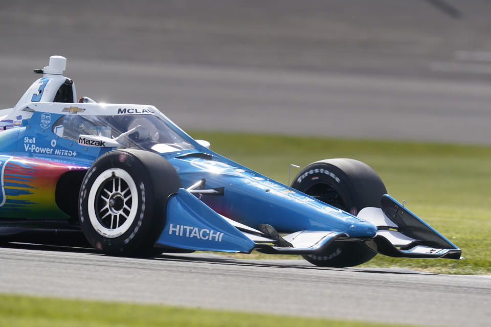 Scott McLaughlin, of New Zealand, drives during qualifications for the IndyCar auto race at Indianapolis Motor Speedway, Friday, May 14, 2021, in Indianapolis. (AP Photo/Darron Cummings)
