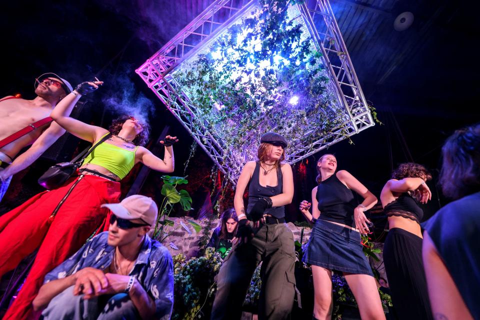 Revellers dance at a rave party in central Kyiv, Ukraine August 27, 2022.