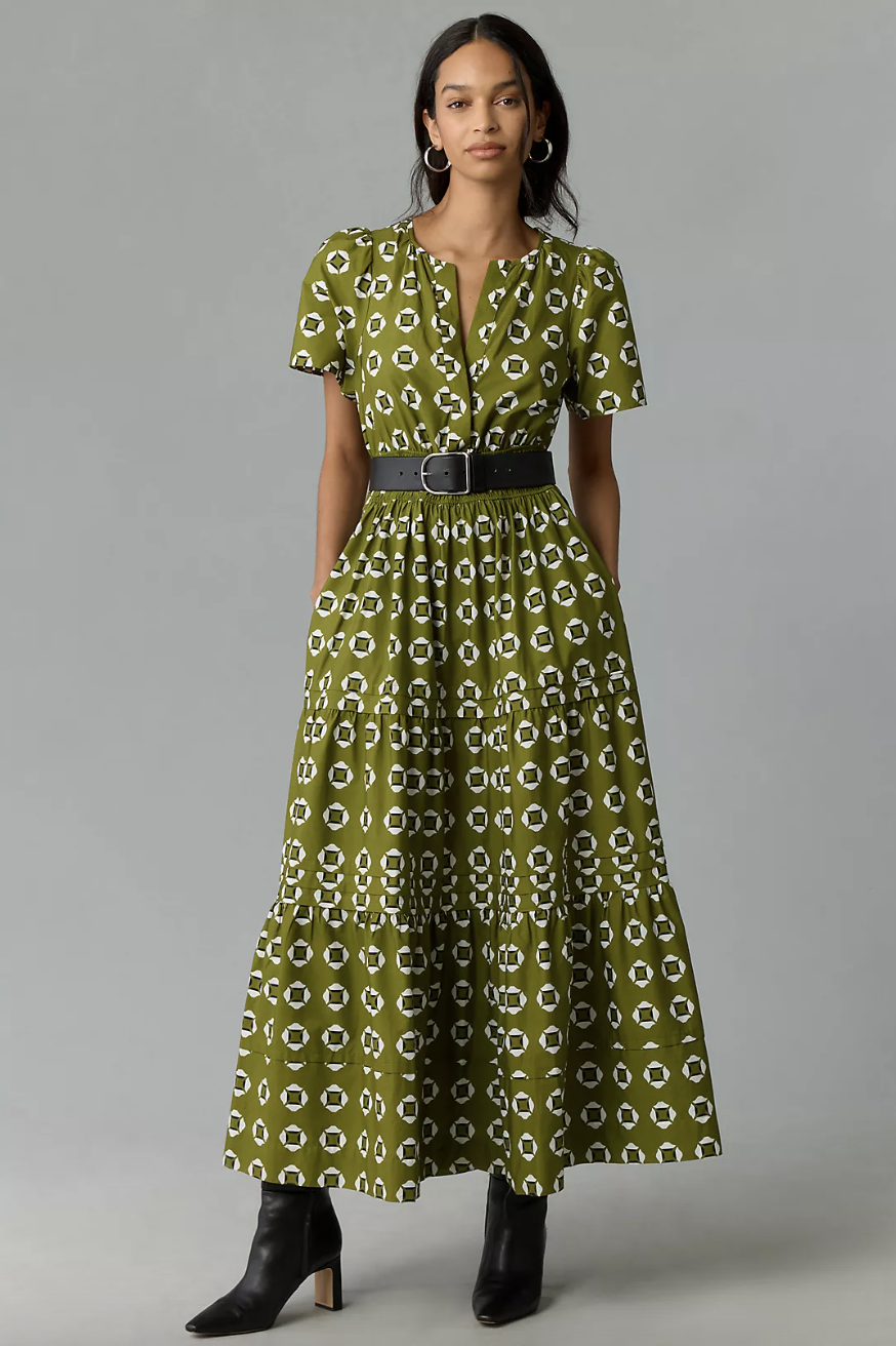 model wearing black heel boots, green printed somerset maxi dress anthropologie with black belt, The Somerset Maxi Dress in Moss (Photo via Anthropologie)