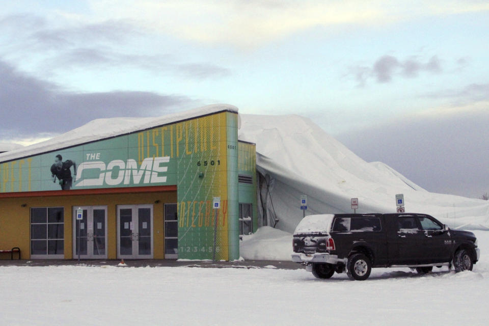 The Dome, a 180,000-square foot indoor sports facility in Anchorage, Alaska, is seen on Tuesday, Jan. 24, 2017, three days after the thin, flexible plastic roof collapsed in the midst of a snowstorm. The facility is among others, including an old lumber mill in Oregon, the main grocery store in a small Idaho town, and a conference center in Colorado that have collapsed under the accumulated weight of snow this winter. (AP Photo/Mark Thiessen)