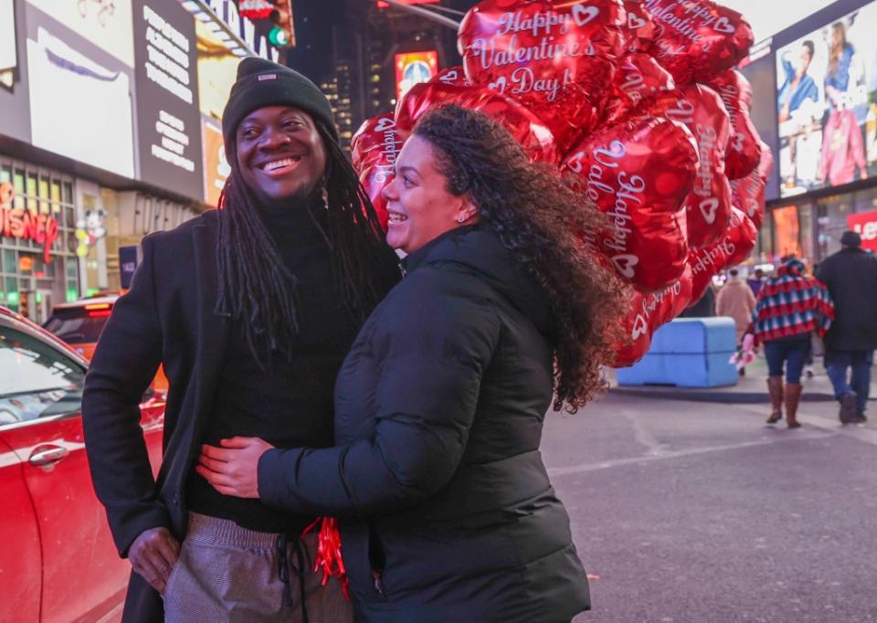 True love still exists in New York City: A happy couple is pictured in Times Square on Valentine’s Day. Anadolu via Getty Images