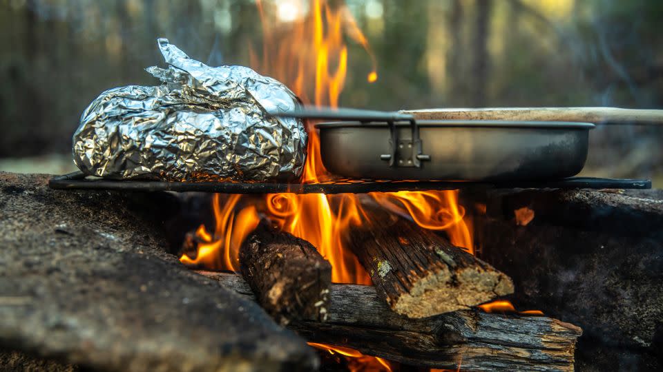 Simple to prepare in advance, foil packets are among the easiest meals for a campfire cooking newbie to whip up. - Harlan Schwartz/Moment RF/Getty Images