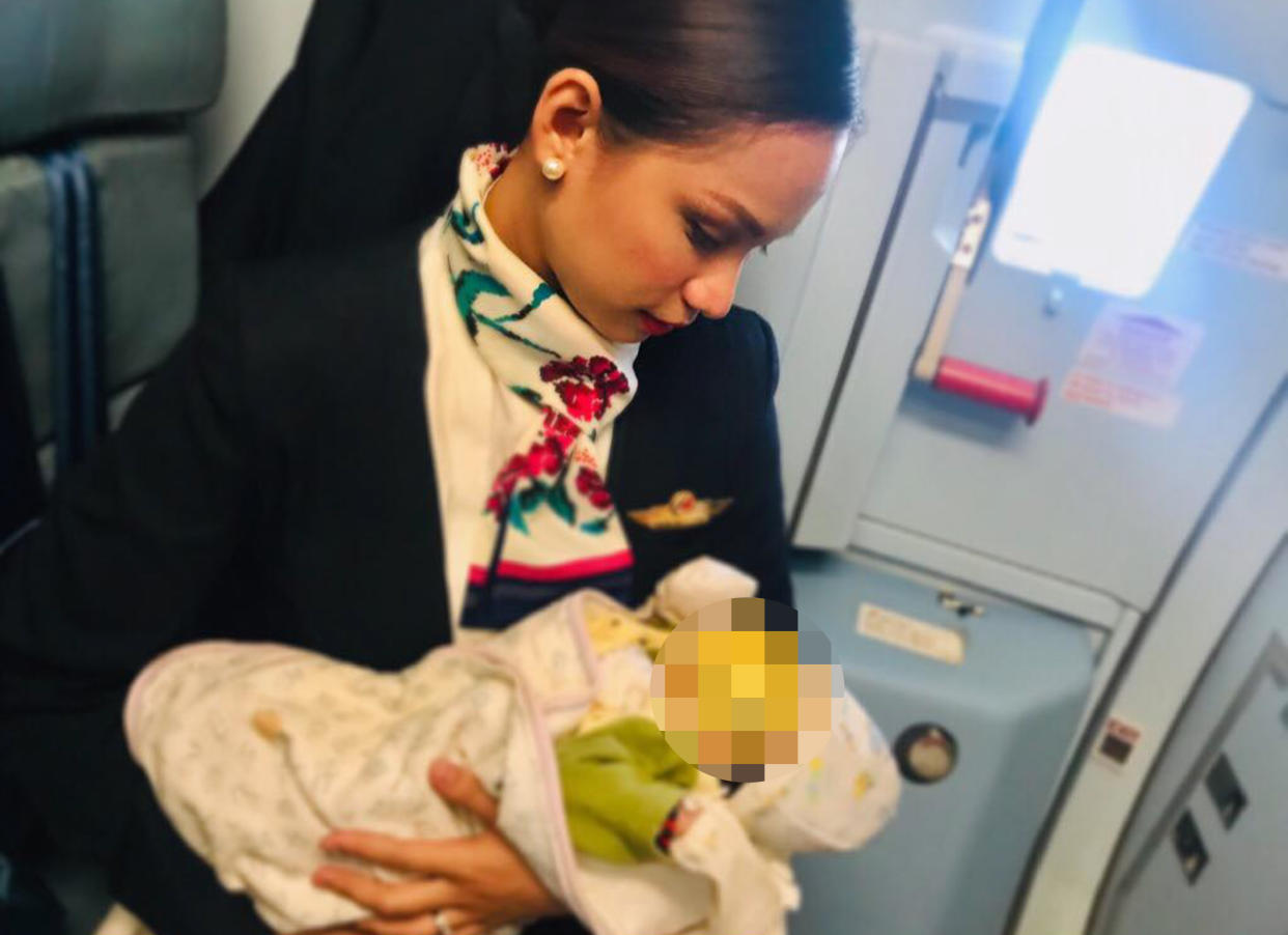 “I breastfed a stranger’s baby inflight,” flight attendant Patrisha Organo wrote in a Facebook post that’s gone viral. (Photo: Caters News Agency)