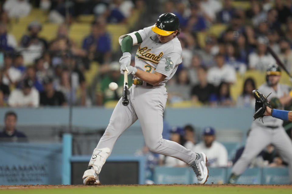 Oakland Athletics' Tyler Soderstrom (37) hits a home run during the eighth inning of a baseball game against the Los Angeles Dodgers in Los Angeles, Thursday, Aug. 3, 2023. (AP Photo/Ashley Landis)