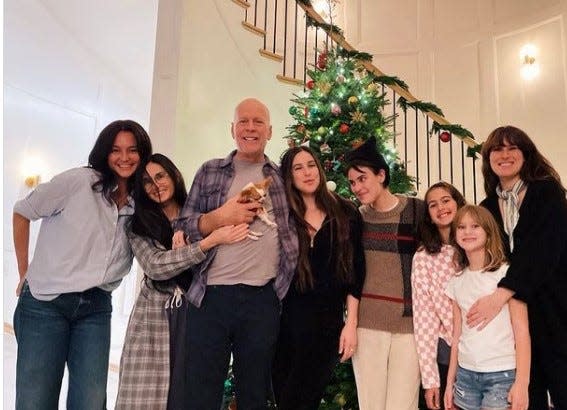 In a December Instagram post captioned "We are FAMILY!! Getting into the holiday spirit!" Demi Moore shared this pic on her feed. From left: Emma Heming Willis, Demi Moore, Bruce Willis (holding daughter Tallulah's dog Pilaf), Scout Willis, Tallulah Willis, Evelyn Willis, Mabel Willis, Rumer Willis.