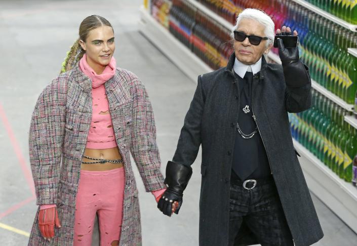 German Designer Karl Lagerfeld (r) and British Model Cara Delevingne (l) Take to the Catwalk at the End of the Fall/winter 2014/15 Ready to Wear Collection by Chanel in Paris France 04 March 2014 the Presentation of the Women's Collections Runs From 25 February to 05 March France ParisFrance Paris Fashion Week - Mar 2014