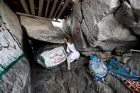A Muslim pilgrim visits the Mount Al-Noor, where Muslims believe Prophet Mohammad received the first words of the Koran through Gabriel in the Hera cave, ahead of annual Haj pilgrimage in the holy city of Mecca, Saudi Arabia August 18, 2018. REUTERS/Zohra Bensemra