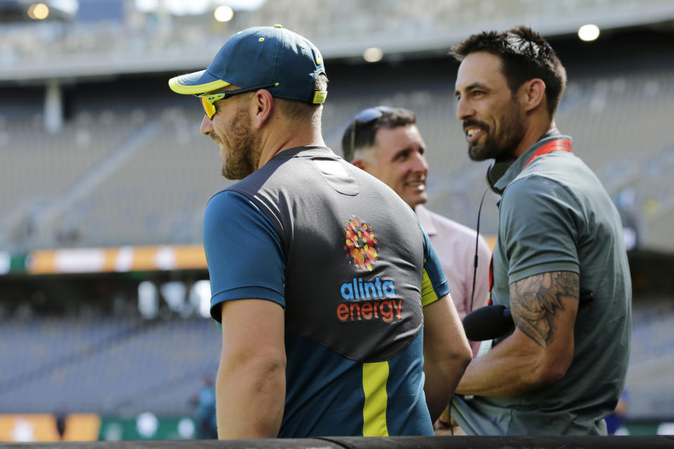 Mitchell Johnson, pictured here speaking to Aaron Finch before a T20 international in 2019.