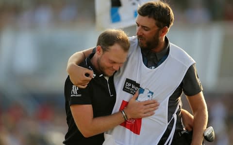 England's Danny Willett hugs his caddy as after he won the DP World Tour Championship golf tournament in Dubai, United Arab Emirates, Sunday, Nov. 18, 2018 - Credit:  AP