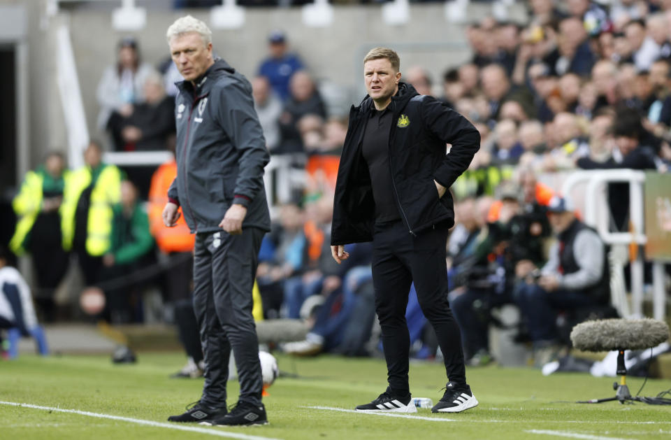 Newcastle United manager Eddie Howe, right, and West Ham United manager David Moyes during the English Premier League soccer match between Newcastle United and West Ham at St. James' Park, Newcastle upon Tyne, England, Saturday March 30, 2024. (Richard Sellers/PA via AP)