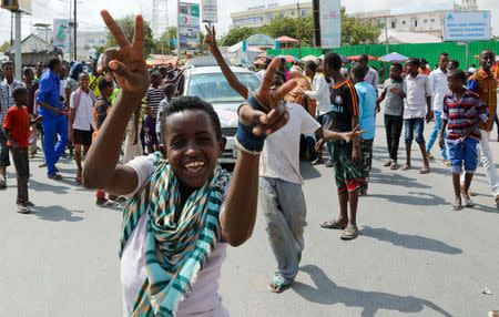 A protester gestures while demonstrating against last weekend's explosion in KM4 street in the Hodan district in Mogadishu, Somalia October 18, 2017. REUTERS/Feisal Omar