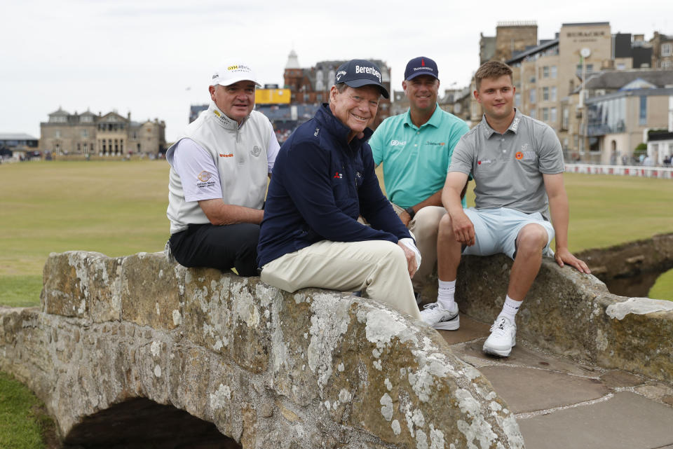 Scotland's Paul Lawrie, Tom Watson of the US, Stewart Cink and Kipp Popert, from left, pose for a photo on the Swilken bridge during a 'Champions round' as preparations continue for the British Open golf championship on the Old Course at St. Andrews, Scotland, Monday July 11, 2022. The Open Championship returns to the home of golf on July 14-17, 2022, to celebrate the 150th edition of the sport's oldest championship, which dates to 1860 and was first played at St. Andrews in 1873. (AP Photo/Peter Morrison)