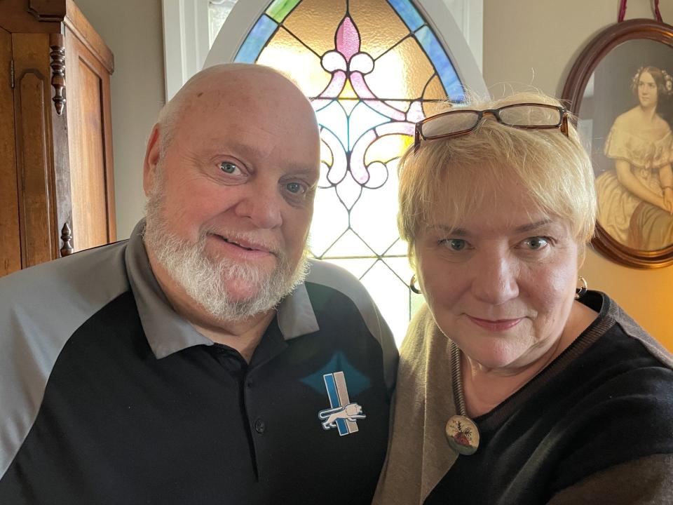 The Rev. Douglas and Sharon Ralston's home is filled with antiques and family heirlooms. They are pictured in front of a stained glass window that was once in a Harrison Street church where Douglas attended as a child. The church was originally built in 1905 and was later torn down to make room for a new structure. The Ralstons purchased the window in pieces. A window expert pieced it back together, and Sharon's brother built a stand for it. “It’s very meaningful to us," Sharon said.