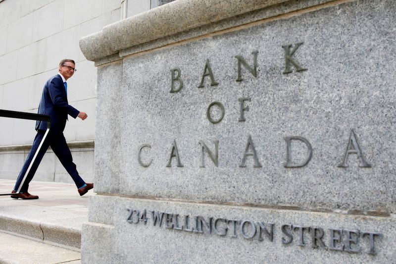 FILE PHOTO: Governor of the Bank of Canada Tiff Macklem walks outside the Bank of Canada building in Ottawa