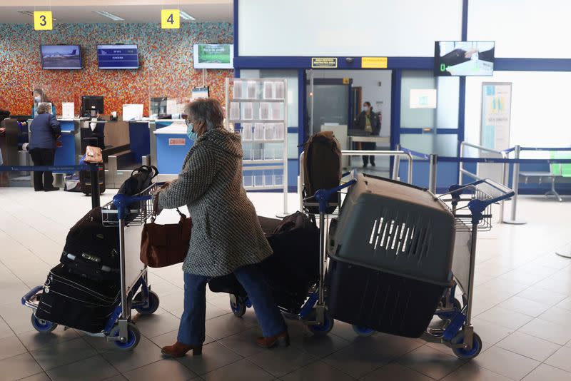 People leave Sao Jorge island on the last commercial flight of the day, in Velas, Azores