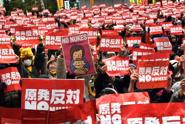 Protesters raise anti-nuclear placards at a rally denouncing nuclear power plants on March 8, 2015, in Tokyo. Thousands of people took part in the demonstration ahead of the fourth anniversary of the tsunami-linked disaster at the Fukushima nuclear plant. (Photo: YOSHIKAZU TSUNO/AFP via Getty Images)