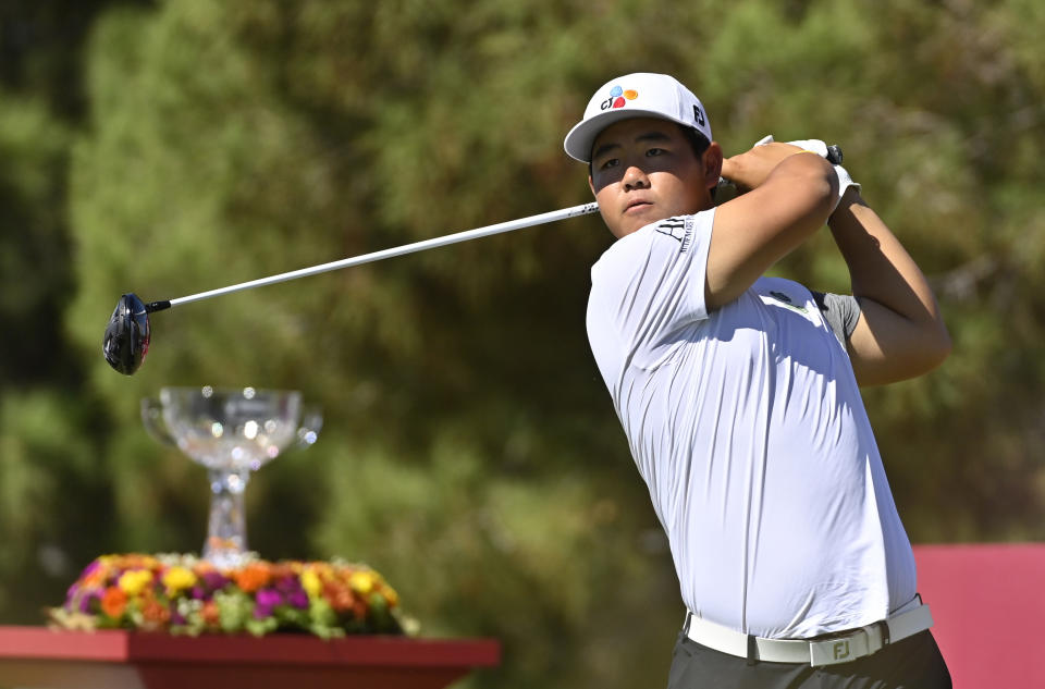 Tom Kim, of South Korea, watches the ball after his tee shot on the first hole during the final round of the Shriners Children's Open golf tournament, Sunday, Oct. 9, 2022, in Las Vegas. (AP Photo/David Becker)