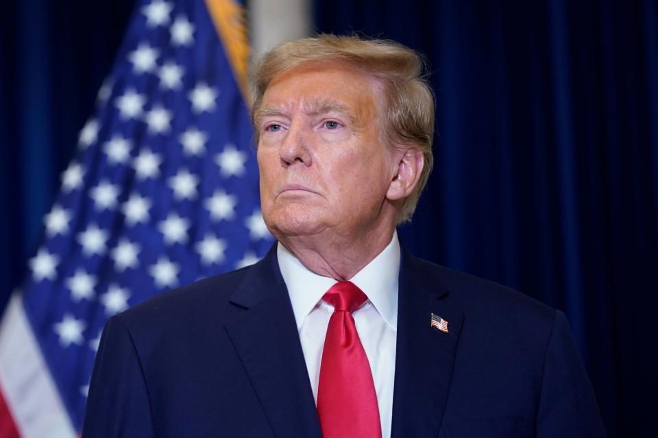 Former President Donald Trump speaks to the media at a Washington hotel, Tuesday, Jan. 9, 2024, after attending a hearing before the D.C. Circuit Court of Appeals at the federal courthouse in Washington.