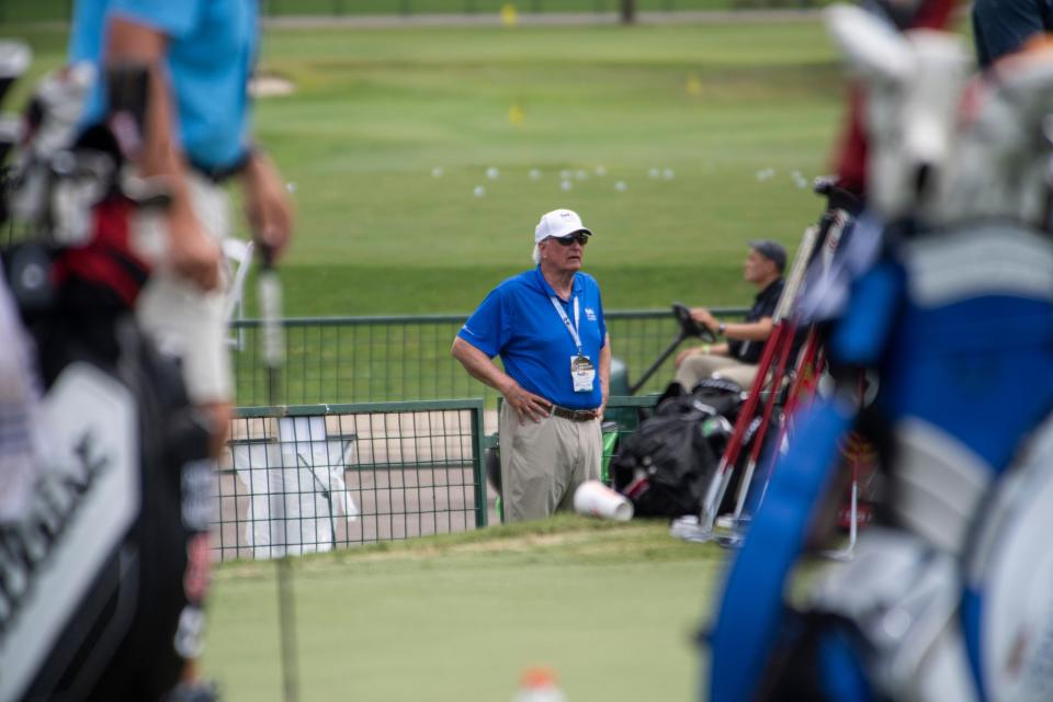 Volunteer Steve Stapleton watches players practice their putting at the TPC Southwind course on Tuesday, August 9, 2022, two days before the start of the FedEx St. Jude Championship in Memphis, TN. Stapleton, who has been volunteering for seven years, said he enjoys seeing the players and watching how they practice but is truly brought back each year for the cause of supporting St. Jude and seeing his fellow volunteers. "Most of my team I only see once a year but it is like family and they all do it because they want to see a greater good," he said. "At the end of the day it's about our charity here so it makes it easy to come back."