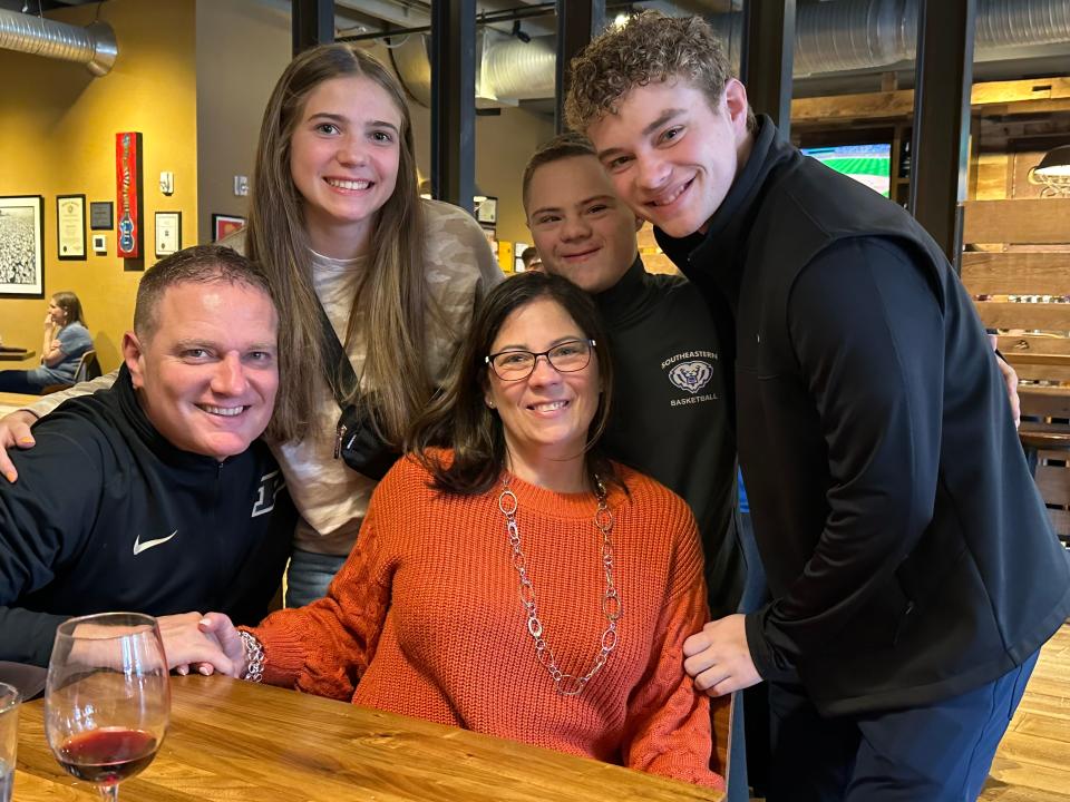 Dan and Jeanine Huppenthal pose for a photo with their children (L-R): Allie, Brendan and Ryan.