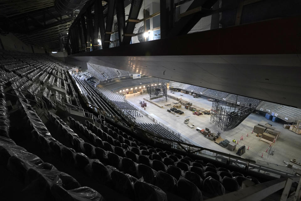 The ice and upper seating areas of Climate Pledge Arena are viewed during a media tour of the facility, Monday, July 12, 2021, in Seattle. The arena will be the home of the NHL hockey team Seattle Kraken and the WNBA Seattle Storm basketball team as well as hosting concerts and other performing arts events. (AP Photo/Ted S. Warren)