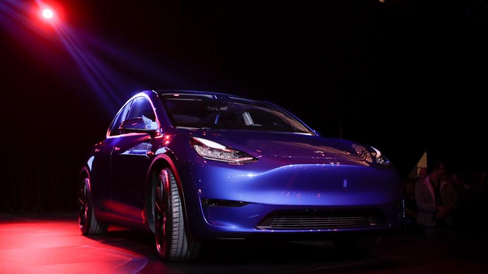 Mandatory Credit: Photo by Jae C Hong/AP/Shutterstock (10156342b)The Tesla Model Y is unveiled at Tesla's design studio, in Hawthorne, Calif.