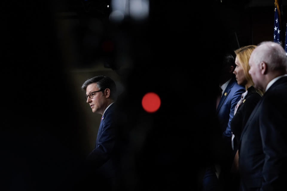 US Speaker of the House Mike Johnson (L), Republican of Louisiana, speaks during a news conference after a closed-door House Republican caucus meeting on Capitol Hill in Washington, DC on February 29, 2024. (Photo by Drew ANGERER / AFP) (Photo by DREW ANGERER/AFP via Getty Images)