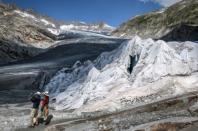 Part of the Rhone Glacier is covered with insulating foam to prevent it from melting during the August 2018 heatwave that swept across northern Europe