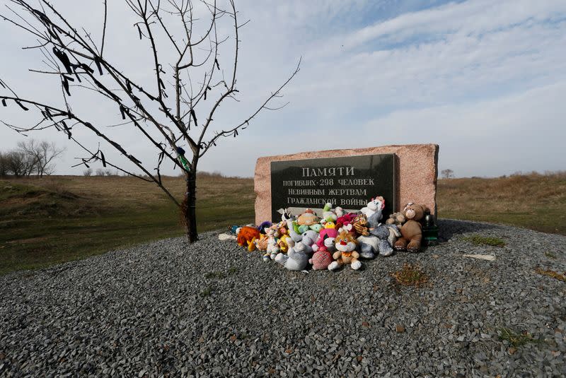 Toys are placed at a memorial to victims of Malaysia Airlines Flight MH17 plane crash near the village of Hrabove