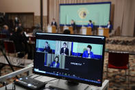 A computer monitor shows the live streaming of the candidates for the presidential election of the ruling Liberal Democratic Party speaking at a debate session hosted by the Japan National Press Club Saturday, Sept. 18, 2021 in Tokyo. The contenders are, from left, Taro Kono, the cabinet minister in charge of vaccinations, Fumio Kishida, former foreign minister, Sanae Takaichi, former internal affairs minister, and Seiko Noda, former internal affairs minister. (AP Photo/Eugene Hoshiko, Pool)