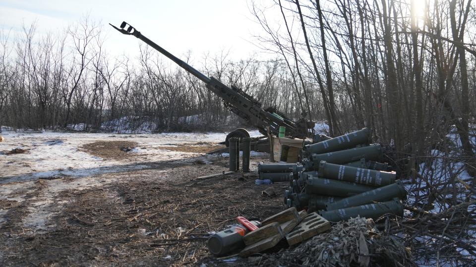 A side view of an American-made M777 howitzer artillery weapon, minutes before it fired on Russian positions in Bakhmut, a Ukrainian city in the Donbas region. Photo date: Feb. 11, 2023.