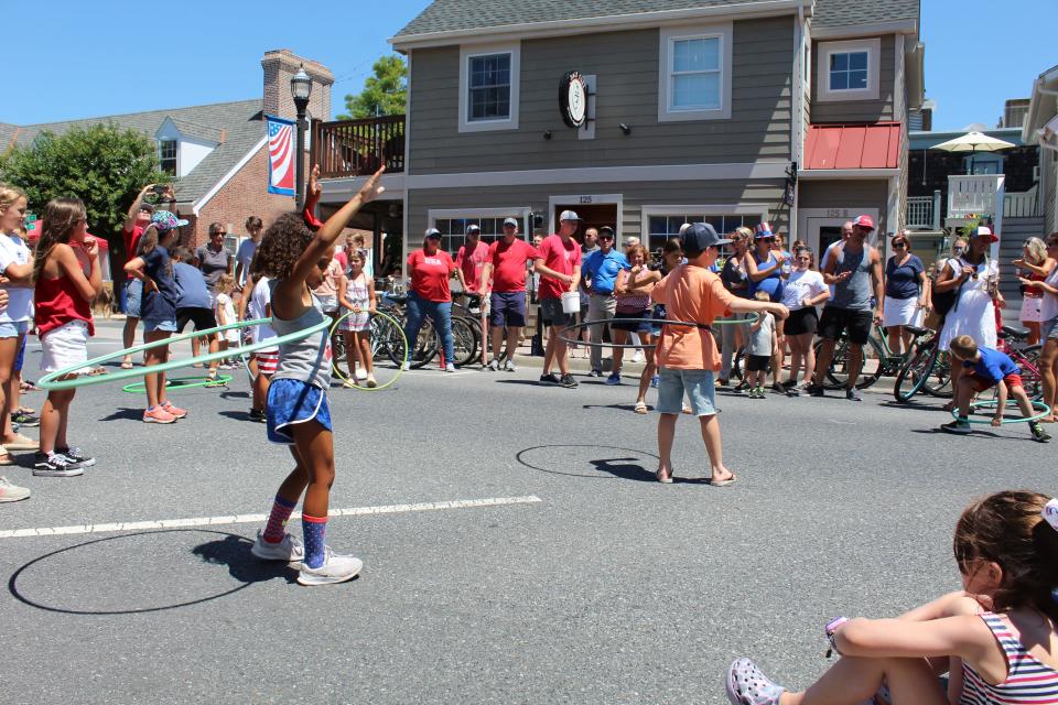 Children participate in the games on Second Street in Lewes Monday, July 4, 2022.