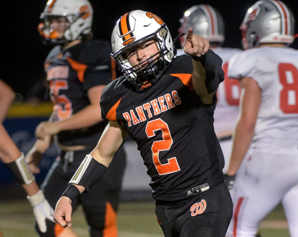 Washington's Kainon McQueary points to fans after scoring what would be the winning touchdown against Morton in the final minutes of the fourth quarter Friday, Oct. 21, 2022 in Washington. The Panthers defeated the Potters 7-0.