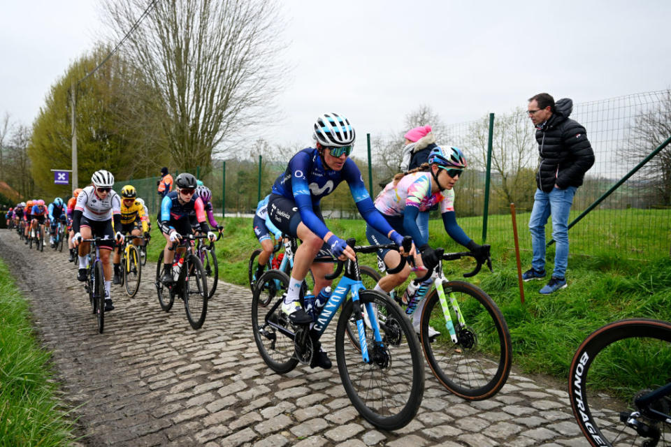 OUDENAARDE BELGIUM  APRIL 02 LR Aude Biannic of France and Movistar Team and Elise Chabbey of Switzerland and Team CanyonSRAM Racing compete passing through a cobblestones sector during the 20th Ronde van Vlaanderen  Tour des Flandres 2023 Womens Elite a 1566km one day race from Oudenaarde to Oudenaarde  UCIWWT  on April 02 2023 in Oudenaarde Belgium Photo by Luc ClaessenGetty Images