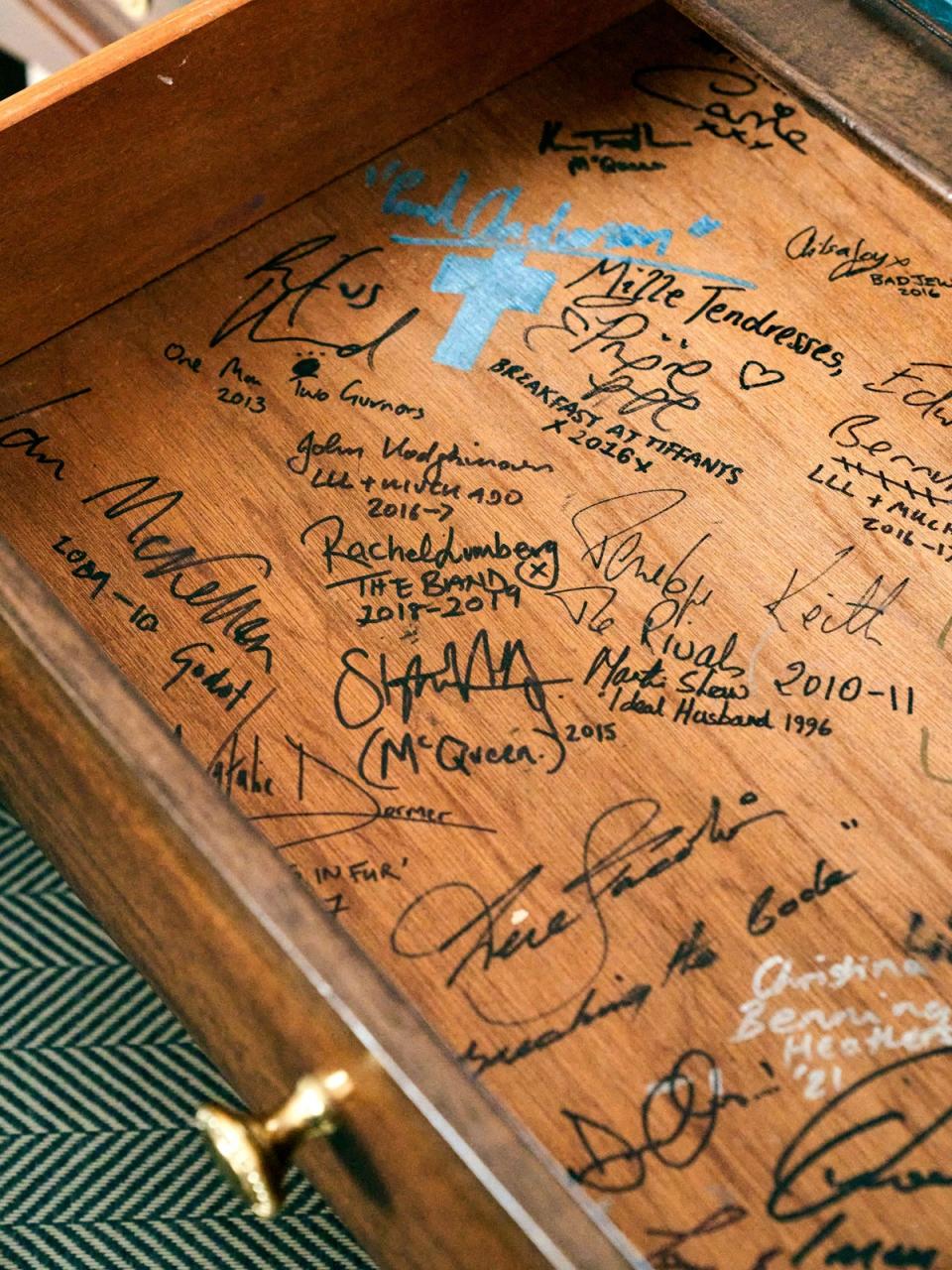 The drawer signed by stars, photo by Simon Brown (Courtesy of Theater Royal Haymarket and Kit Kemp Design Studio)