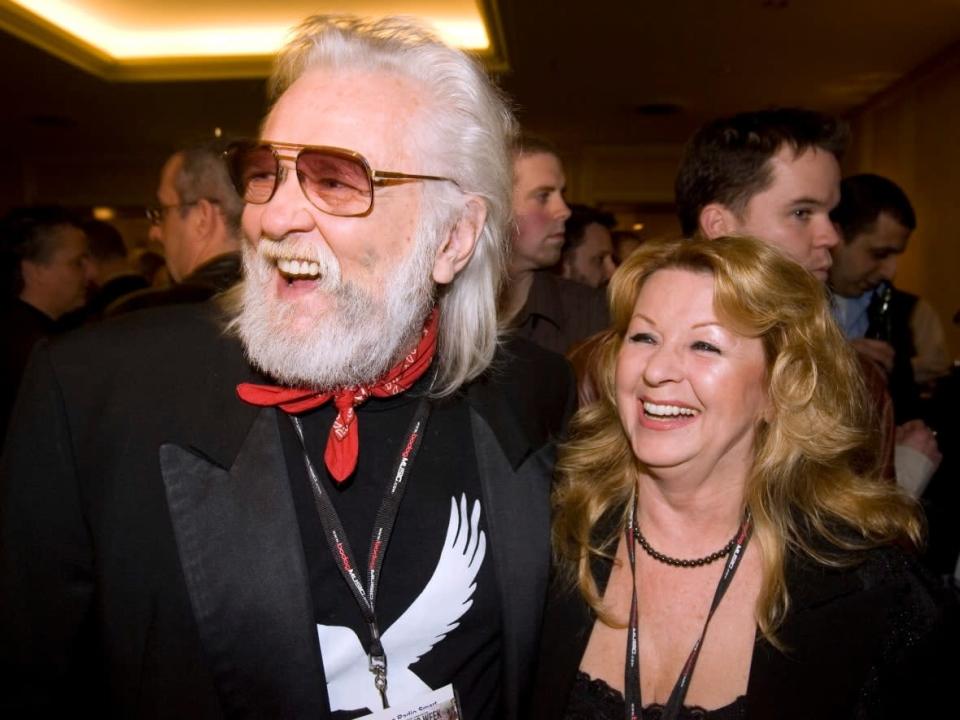 Ronnie Hawkins, left, is pictured with his wife, Wanda, in 2007. Hawkins, the Southern rockabilly singer who was an early influence on members of the Band, has died at 87. (Frank Gunn/The Canadian Press - image credit)