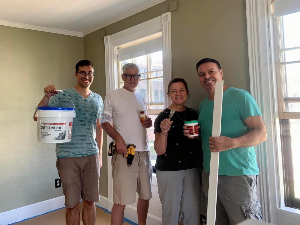 From left, Preservation Society of Fall River members Alex Silva, Jim Soule, Connie Soule and Jim Souza rehab an apartment in the Dr. Isaac Fiske house on Pine Street.