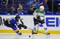 Dec 7, 2017; St. Louis, MO, USA; Dallas Stars defenseman Esa Lindell (23) clears the puck past St. Louis Blues center Brayden Schenn (10) during the second period at Scottrade Center. Mandatory Credit: Jeff Curry-USA TODAY Sports