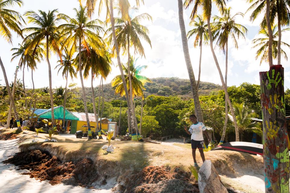 A child plays on the beach in Providencia.