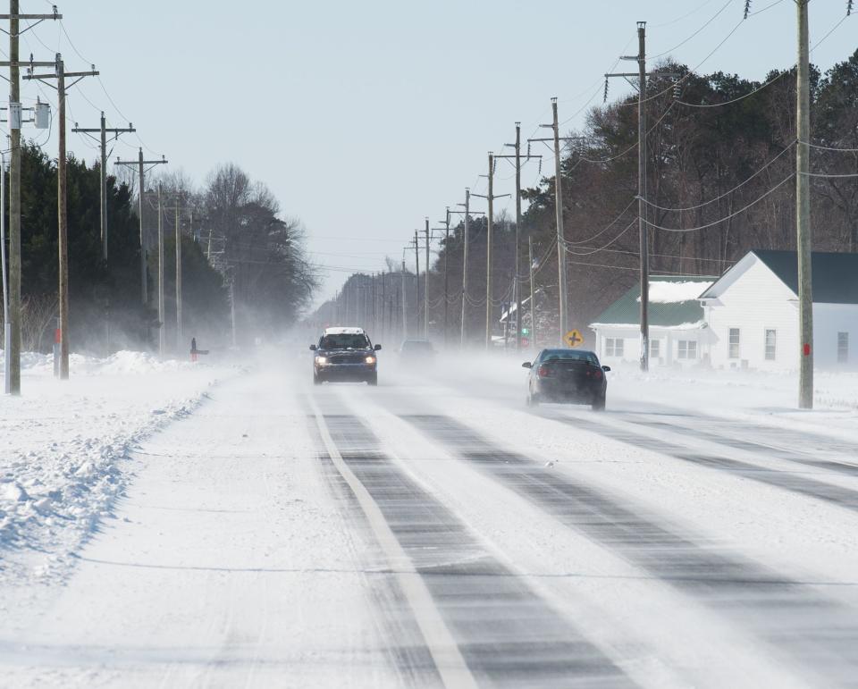 Cars drive along Route 9 west of Georgetown.