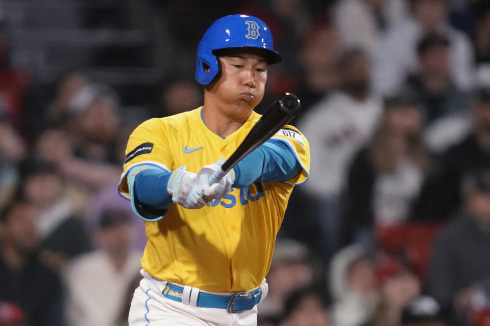 Boston Red Sox's Masataka Yoshida reacts while flying out during the seventh inning of the team's baseball game against the Los Angeles Angels, Friday, April 12, 2024, in Boston. (AP Photo/Charles Krupa)