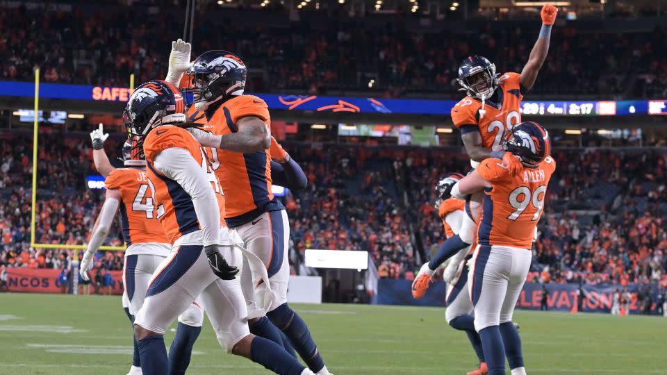 Members of the Denver Broncos defense celebrates after a safety late in the game against the Cleveland Browns sealed the team's 29-12 victory. - RJ Sangosti/MediaNews Group/The Denver Post/Getty Images