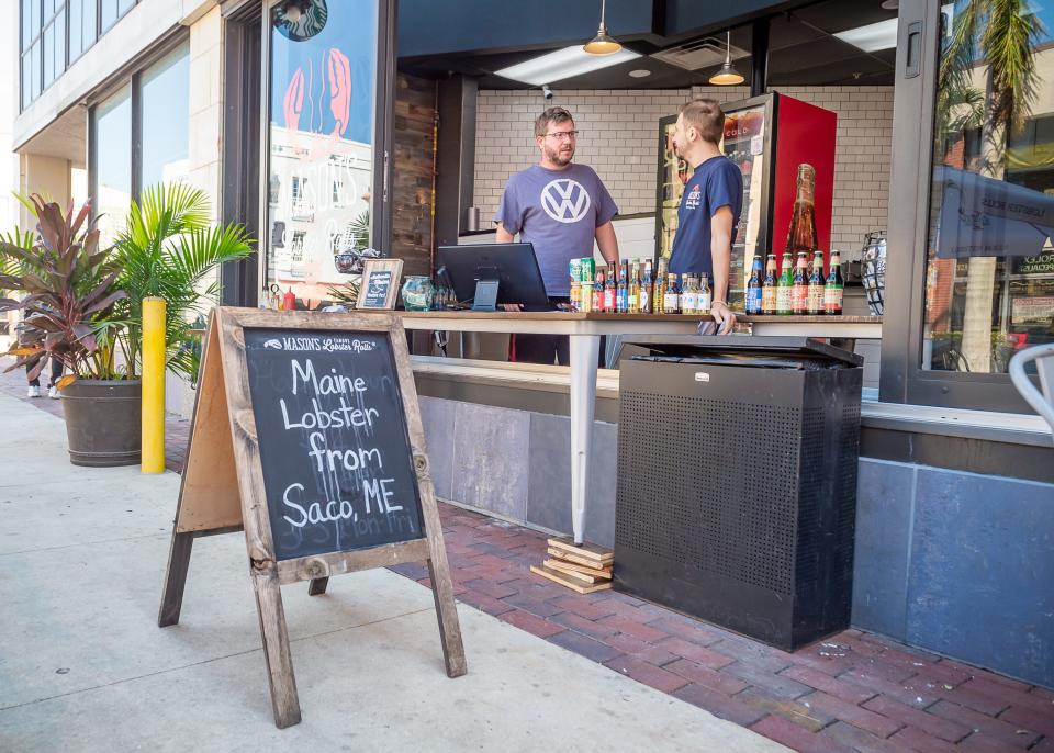 Adam Miner has worked 15 hour days to reopen Masons Lobsters in downtown Ft Myers after  Hurricane Ian. Friday, Oct. 7, 2022.