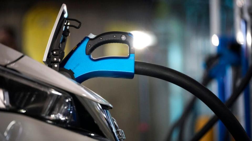 Electric vehicles are displayed before a news conference with White House Climate Adviser Gina McCarthy and U.S. Secretary of Transportation Pete Buttigieg. (Photo by Drew Angerer/Getty Images)