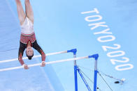 Nina Derwael, of Belgium, competes in the women's artistic gymnastics uneven bars final at the 2020 Summer Olympics, Sunday, Aug. 1, 2021, in Tokyo, Japan. (AP Photo/Jeff Roberson)