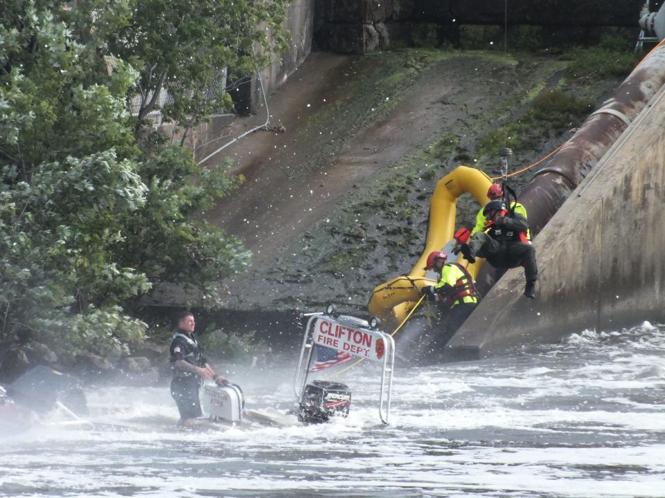 Two Clifton firefighters were rescued from the Passaic River on Wednesday, June 28, 2023 by a New Jersey State Police helicopter.