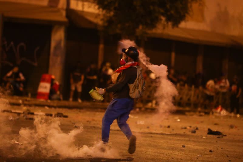 Demonstrators protest to demand President's step down, in Lima