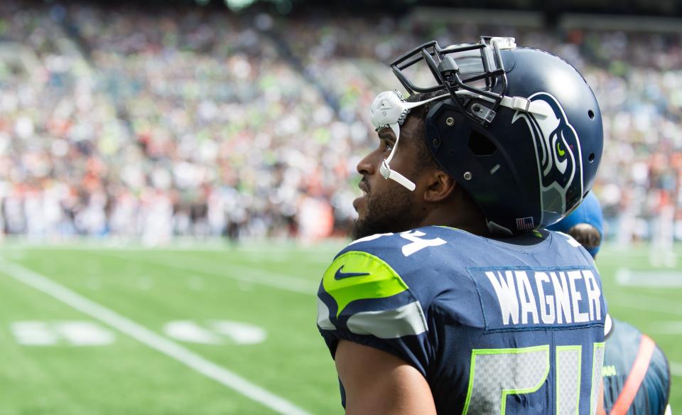 Sep 8, 2019; Seattle, WA, USA; Seattle Seahawks middle linebacker Bobby Wagner (54) looks up at the score board during a replay during the first half at CenturyLink Field. Seattle defeated Cincinnati 21-20. Mandatory Credit: Steven Bisig-USA TODAY Sports - 13331599