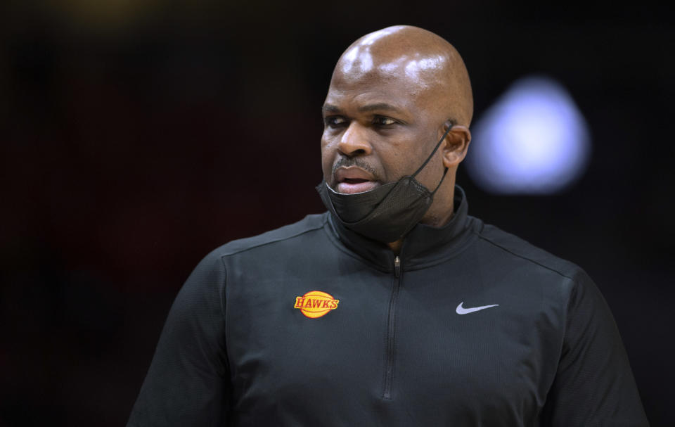 Atlanta Hawks coach Nate McMillan watches during the second half of the team's NBA basketball game against the Chicago Bulls on Monday, Dec. 27, 2021, in Atlanta. (AP Photo/Hakim Wright Sr.)