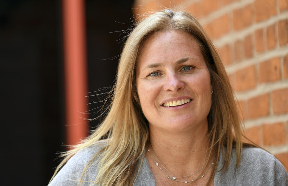 Heather Sloop, a Steamboat Springs City Council member, poses for a portrait, Wednesday, Aug. 3, 2022, in Steamboat Springs, Colo. The city council passed a rule in June that could prove to be a model for other vacation towns: A ban on new short-term rentals in most of the city and a ballot measure to tax bookings at 9% to fund affordable housing. (AP Photo/Thomas Peipert)